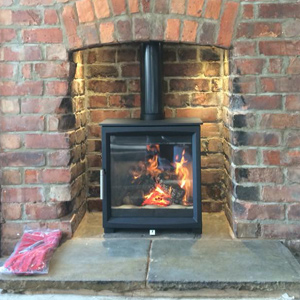 Woodtec 5 Woodburning Stove in brick chimney