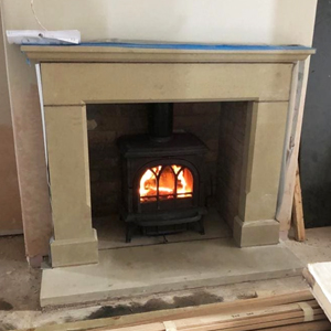 Bespoke Natural Stone Fireplace with Stovax Woodburner